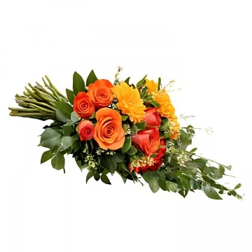 En liggande begravningsbukett med orange och gula snittblommor och grönt.